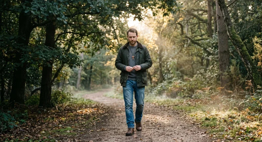 Christian walking toward gentle light as a symbol of healing and hope after betrayal and broken trust.