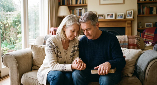 Christian couple praying together for their marriage