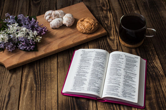 Christian seeking God's guidance through prayer during a morning devotion